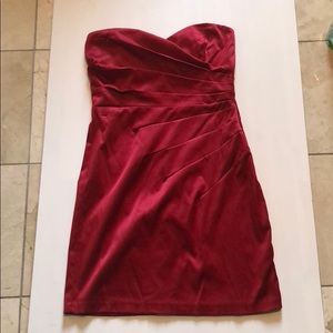 Medium size red strapless dress. Worn 1 time.